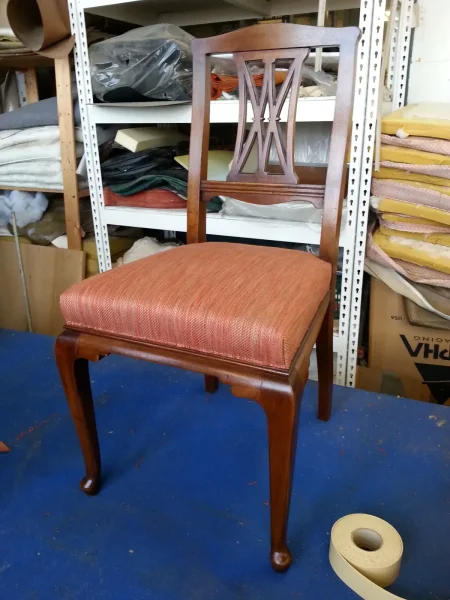 Mahogany chair after re-upholstery and refinishing by Olek Inc.