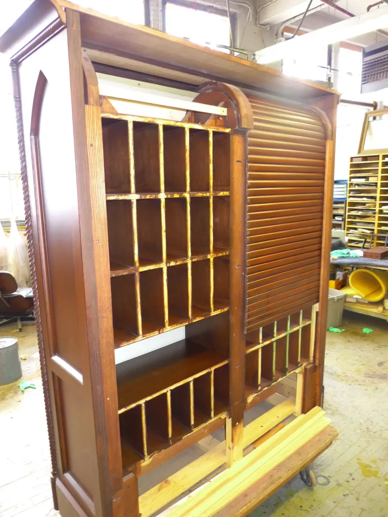 Lobby Woodwork — Desk & Cabinet Sculpting & Fabrication — after restoration by Olek Inc.