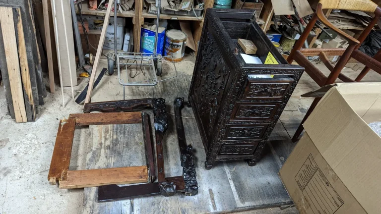 Antique Chinese carved desk after expert damage repair by Olek Inc.